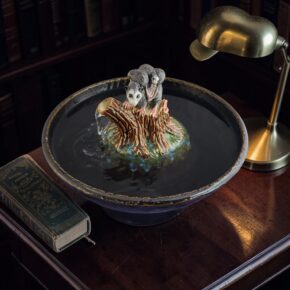 indoor ceramic scupture fountain possom family on a log